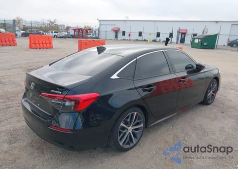 2023 Honda Civic Touring from USA, damaged, VIN 2HGFE1F91PH311709